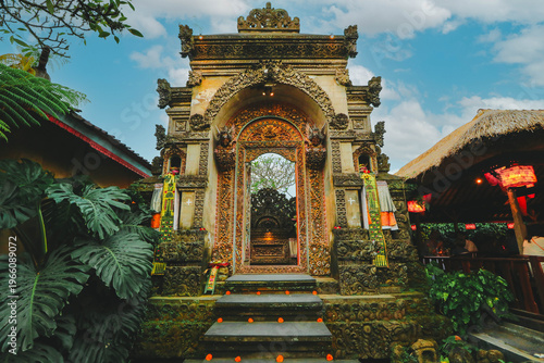 Traditional balinese door beside a restaurant, Bali