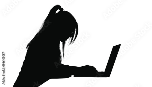 Silhouette of a focused person with long hair typing intently on a portable electronic device against a.