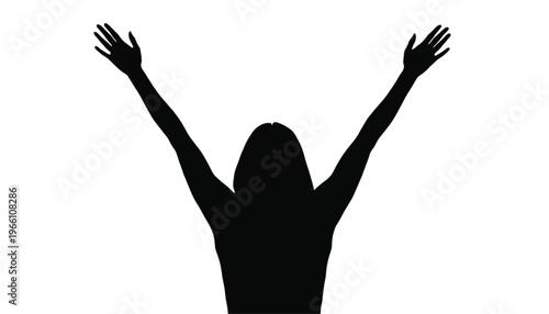 Back view silhouette of a woman with long hair celebrating with both arms stretched widely upwards against.
