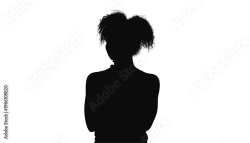 Silhouette of a young girl with pigtails standing with arms crossed against a pure white background.