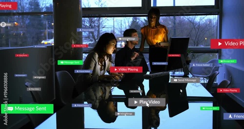 Team typing, tapping while badges popping up, piling over people, table, reviewing business media