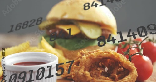 Burger, onion ring, numeric overlay moving, camera pulling back, revealing main burger for food ads
