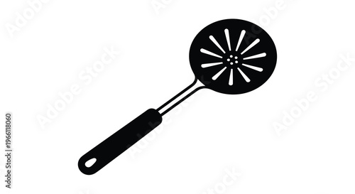 A simple black and white illustration depicts a slotted spatula a common kitchen utensil used for lifting and turning food