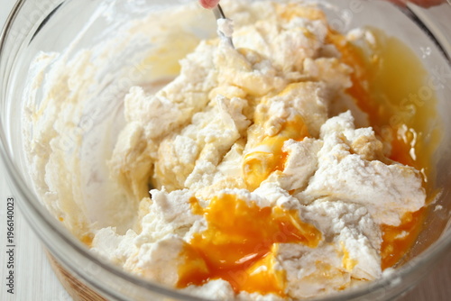 Combine all ingredients to make cheese filling. Making frozen strawberry cheesecake series.