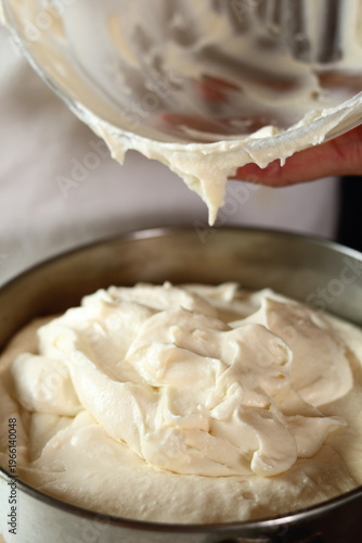 Transfer cheese filling into baking pan. Making frozen strawberry cheesecake series.