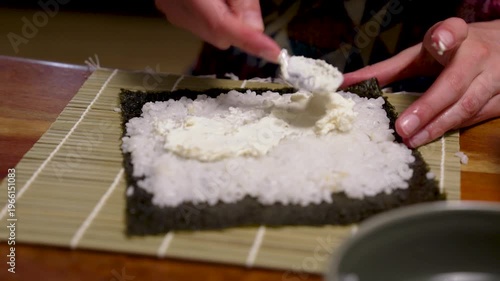 Fried tempeh stripes added to homemade sushi roll with mushrooms and fresh cheese horizontal