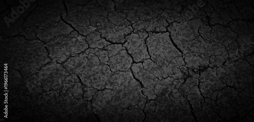 Canvas-taulu Dark cracked soil texture background in black tone