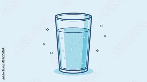 A refreshing glass of sparkling water on a light blue background