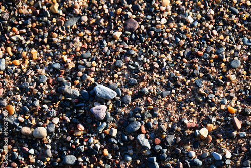 Close up of colorful rocks on the beach in the Apostle Island National Lakeshore on Lake Superior.