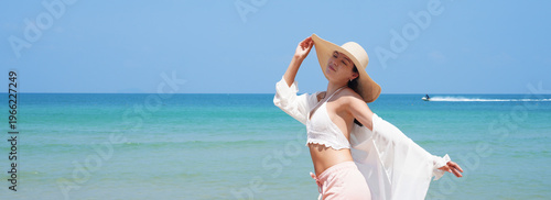 happy young woman on the beach