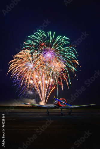 Photos WW2 warbird plane during a fireworks celebration