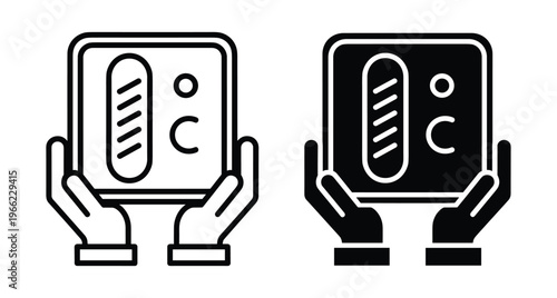 Hands holding digital screen showing bread loaf and degree celsius temperature symbol for baking control and food preparation monitoring process