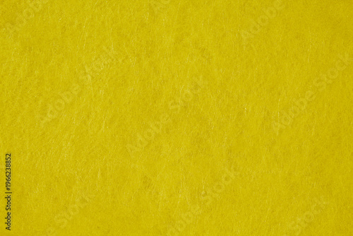 Принти на полотні Vibrant yellow felt fabric texture background with soft fiber details