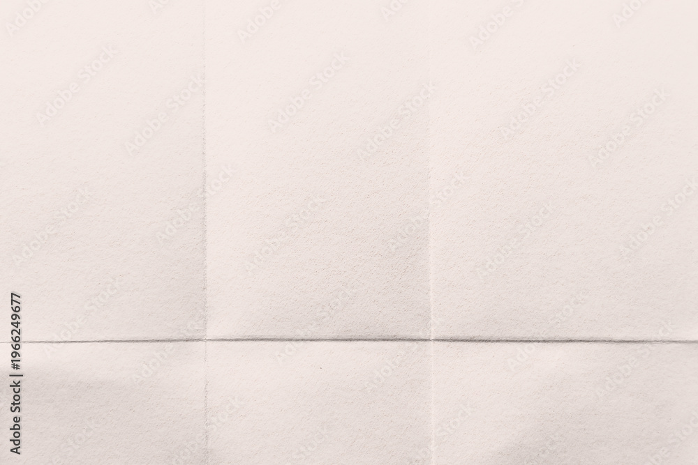 Fototapeta premium Textured folded paper background with copy space