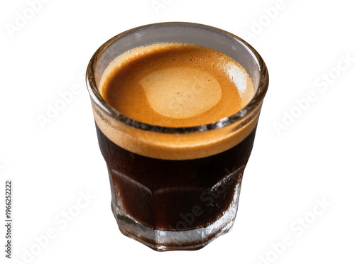 Photos Isolated shot of dark espresso coffee with thick golden crema in a clear glass t