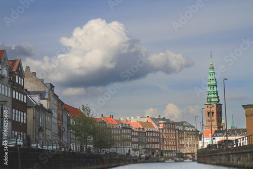 Photography View of Copenhagen canal with Nikolaj Kunsthal tower