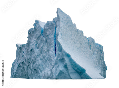 Fotografie Isolated massive blueish white iceberg with dramatic jagged peaks and deeply tex