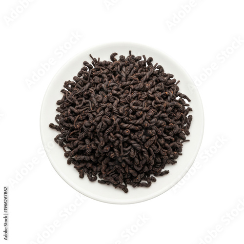 Premium dark oxidized loose-leaf tea on a white plate, isolated on a stark white background in a minimalist top-down view. Concept of natural wellness