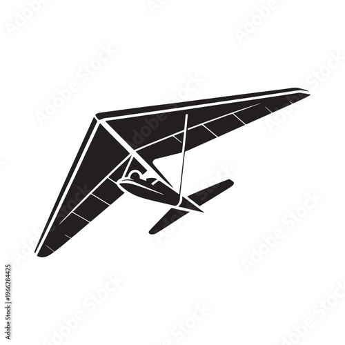 A black silhouette of a hang glider soaring through the air