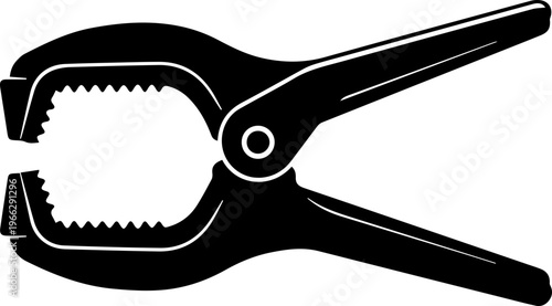 Strong black spring clamp tool for DIY projects, crafting, and workshop tasks securely holding materials