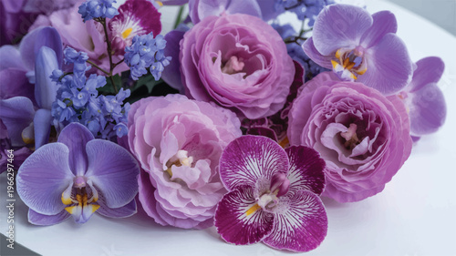 beautiful bouquet of purple flowers and roses on white surface