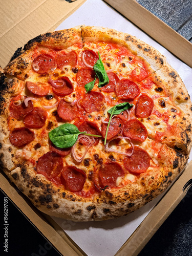 Fresh Pepperoni Pizza on wooden box
