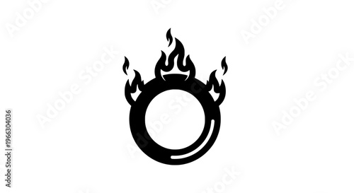 Flaming tire burns fiercely outdoors in daylight