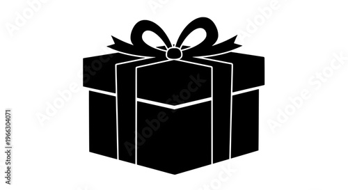 A black gift box with a ribbon on top is sitting alone indoors.