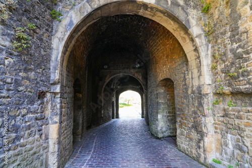 Interior view of a medieval vaulted chamber within the fortified walls of Boulogne-sur-Mer, France