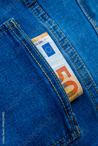 Euro banknotes in denim jeans pocket, European economy, smart personal financial management, Everyday convenience, , spending options, and economic activity, Pickpocketing crime