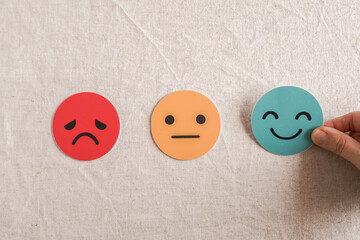 customer feedback, satisfaction rating, experience survey, emotional state, happy face, sad face, neutral face icons on linen background for business reviews and user research.