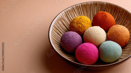 Colorful powders in decorative bowl create vibrant display, showcasing essence of Diwali in small towns where celebrations come alive