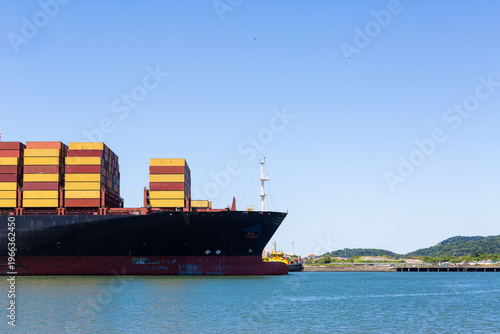 Container ship with stacked cargo at Port of Santos Brazil