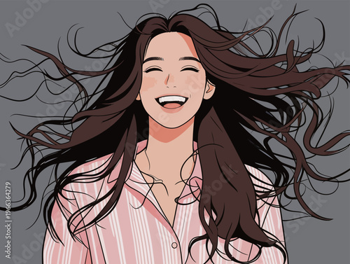 Woman smiles with flowing hair against a simple grey background during daytime, showing happiness and joy in the moment