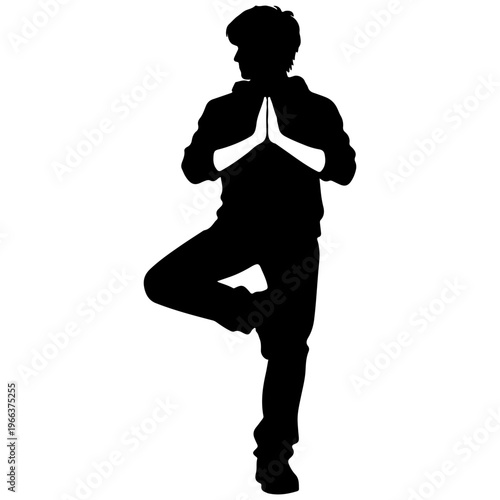 Silhouette of a man in yoga tree pose, meditation gesture