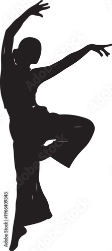 Silhouette of a woman dancing in a graceful pose
