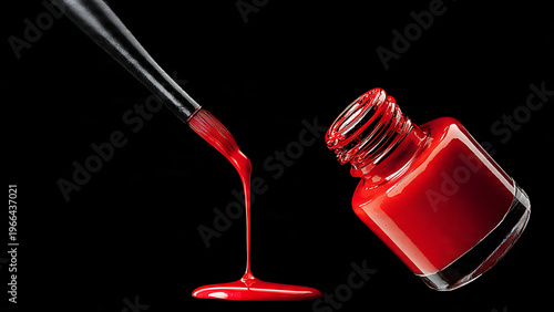 A bottle of red nail polish with a brush dripping the vibrant color onto a dark surface.