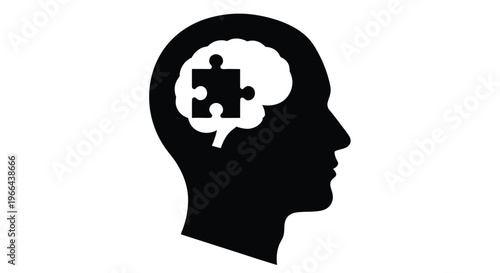 Silhouette of a human head with a puzzle piece representing the brain