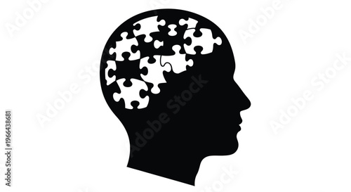 Silhouette of a head filled with jigsaw puzzle pieces representing thought