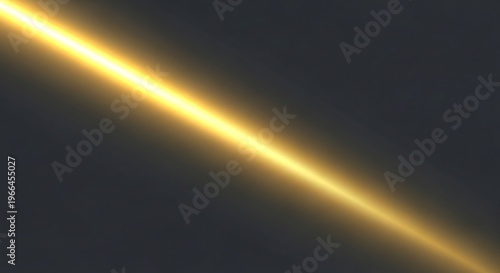 Yellow light streak on dark background beam glow