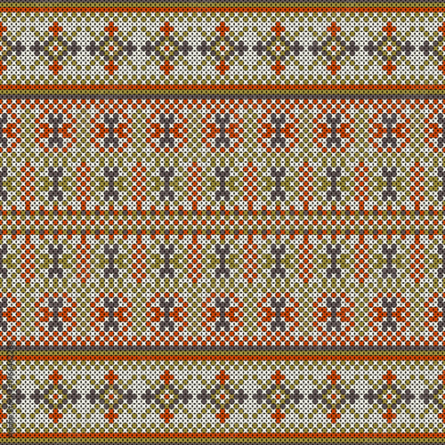 A cross-stitch pattern in a style combining indigenous and geometric motifs, resembling designs found on sweaters or woven fabrics. The green and orange tones make it suitable for home decor and fabr