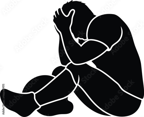 Sad man silhouette sitting on floor holding head feeling depressed lonely and mental health struggle