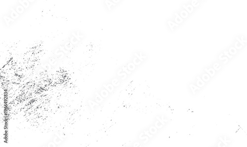 Scattered grey dust particles and irregular shapes on a white background