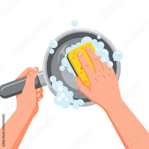 Hands scrubbing a frying pan with a sponge, cleaning dishes with soap bubbles