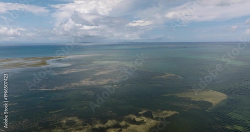 Wallpaper Mural Shallow reef area with turquoise and dark blue water under blue sky. Siargao, Philippines. Torontodigital.ca