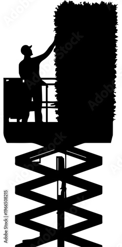 Black Silhouette of a Gardener on a Scissor Lift Trimming a Tall Hedge