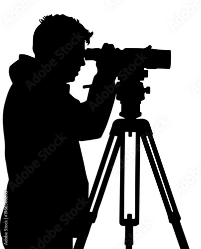 Black Silhouette of a Surveyor Using a Theodolite or a Photographer with a Large Lens on a Tripod