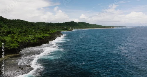 Wallpaper Mural Rocky shore with foamy waves washing over the reef in turquoise water. Siargao, Philippines. Torontodigital.ca