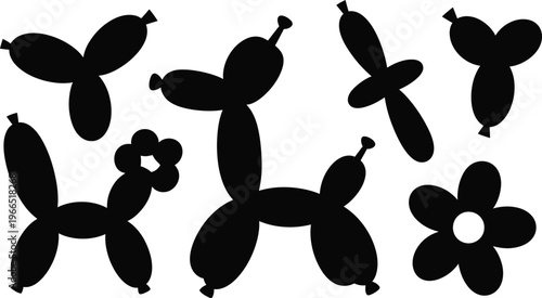 Collection of black balloon animals including dogs and flowers