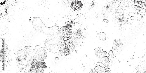 Speckled concrete texture background, abstract pattern of dark spots on a light surface, representing rough plaster or aged wall in monochrome, building material, graphic resource